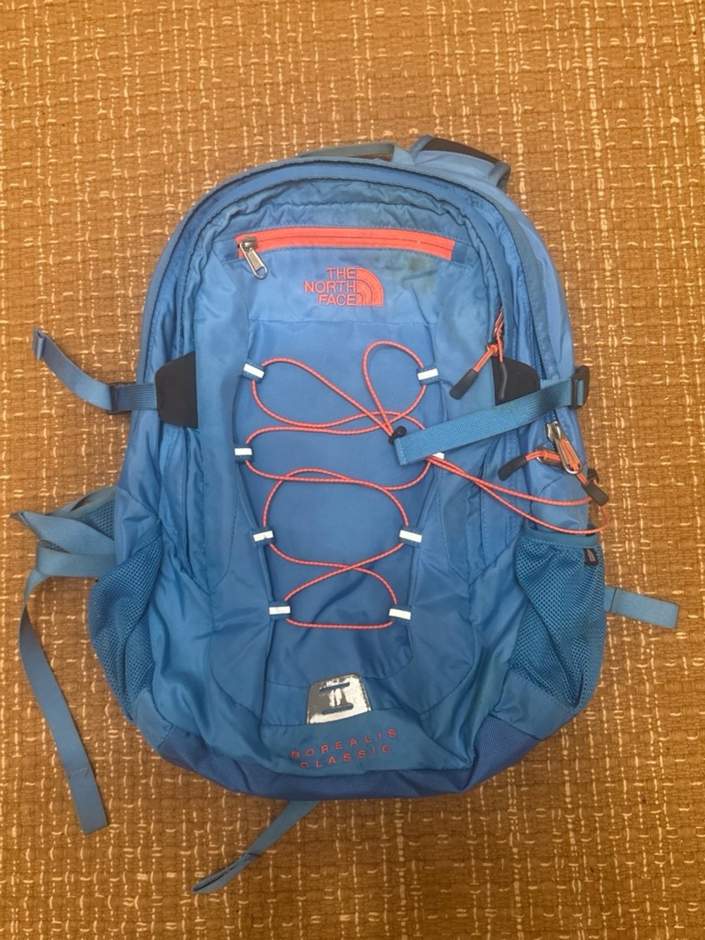 The North Face Sky Blue Backpack with Coral Accents